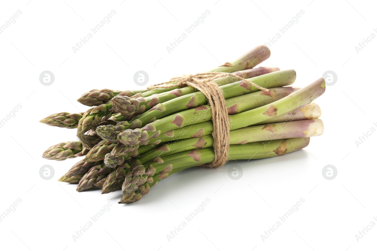 Bunch of fresh raw asparagus spears isolated on white Photo of Bunch of fresh raw asparagus spears isolated on white