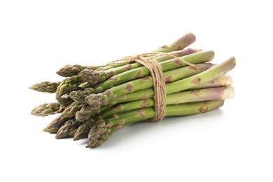 Photo of Bunch of fresh raw asparagus spears isolated on white