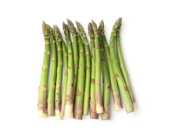 Photo of Fresh raw asparagus spears isolated on white, top view