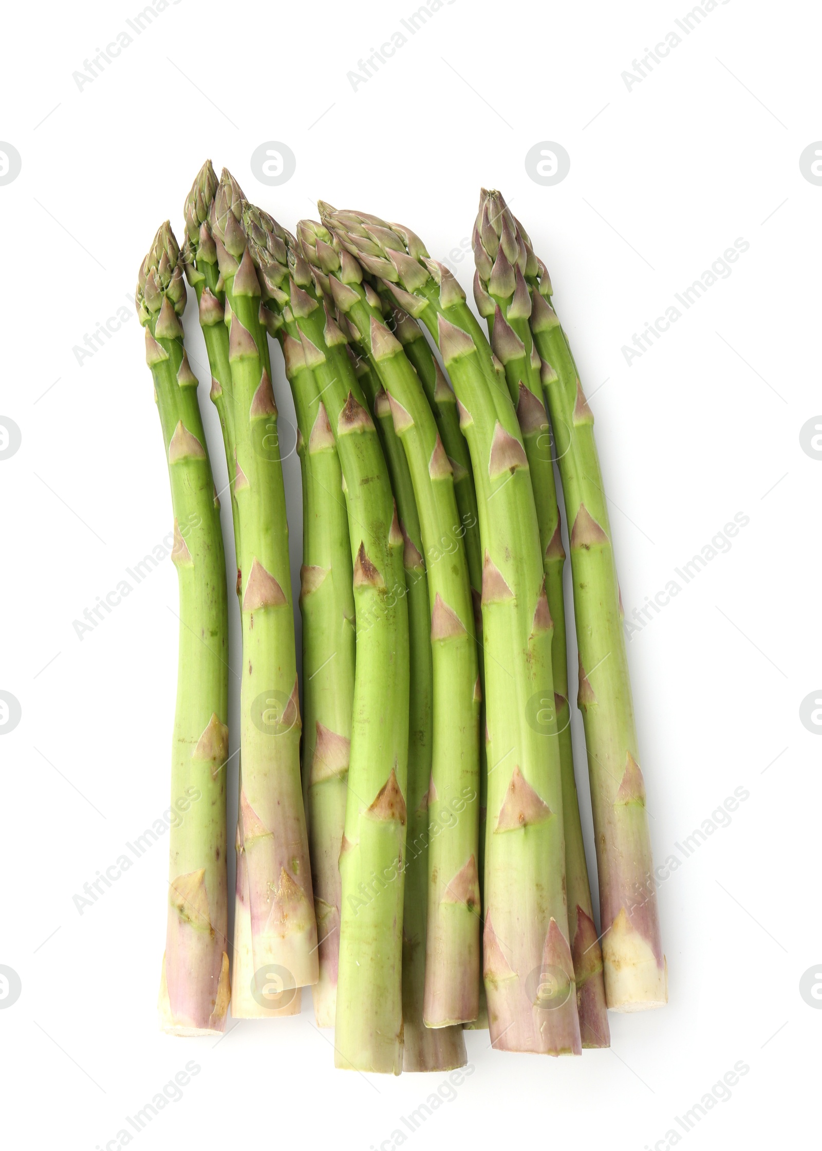 Fresh raw asparagus spears isolated on white, top view Photo of Fresh raw asparagus spears isolated on white, top view