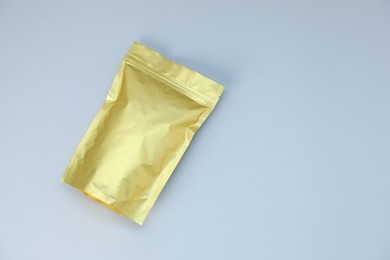 Photo of One zipper stand-up pouch on light grey background, top view. Mockup for design
