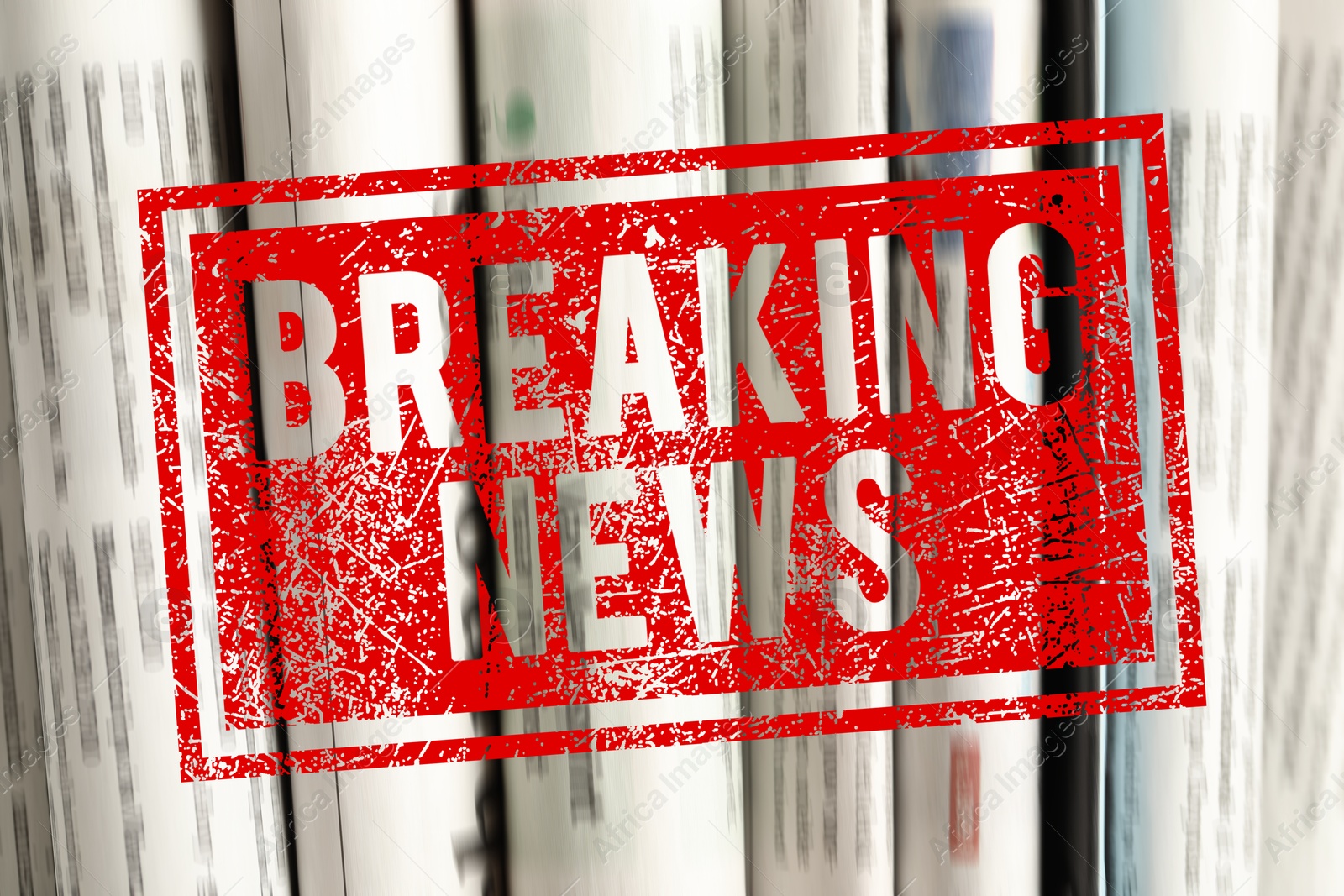 Red Breaking News stamp and newspapers as background, closeup Image of Red Breaking News stamp and newspapers as background, closeup
