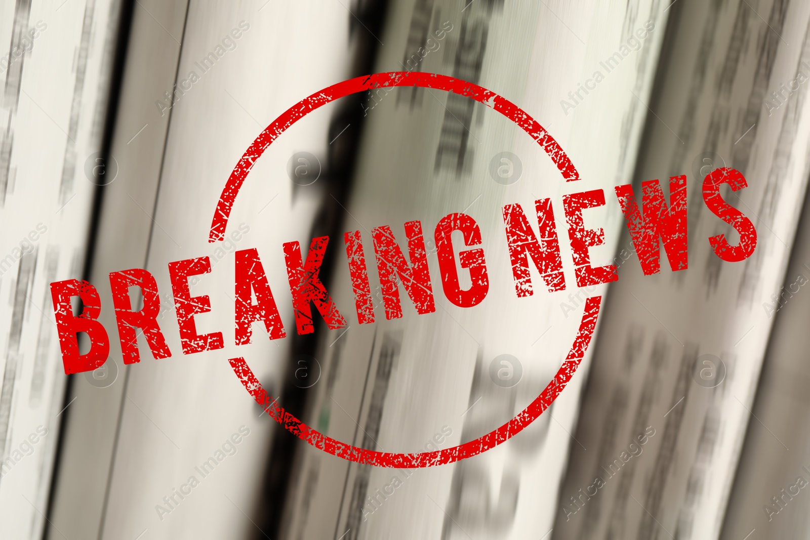 Red Breaking News stamp and newspapers as background, closeup Image of Red Breaking News stamp and newspapers as background, closeup
