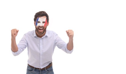 Image of Excited fan with flag of France painted on his face against white background. Banner design with space for text