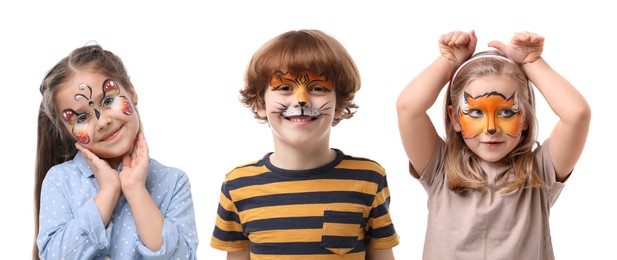 Image of Cute children with face paintings on white background