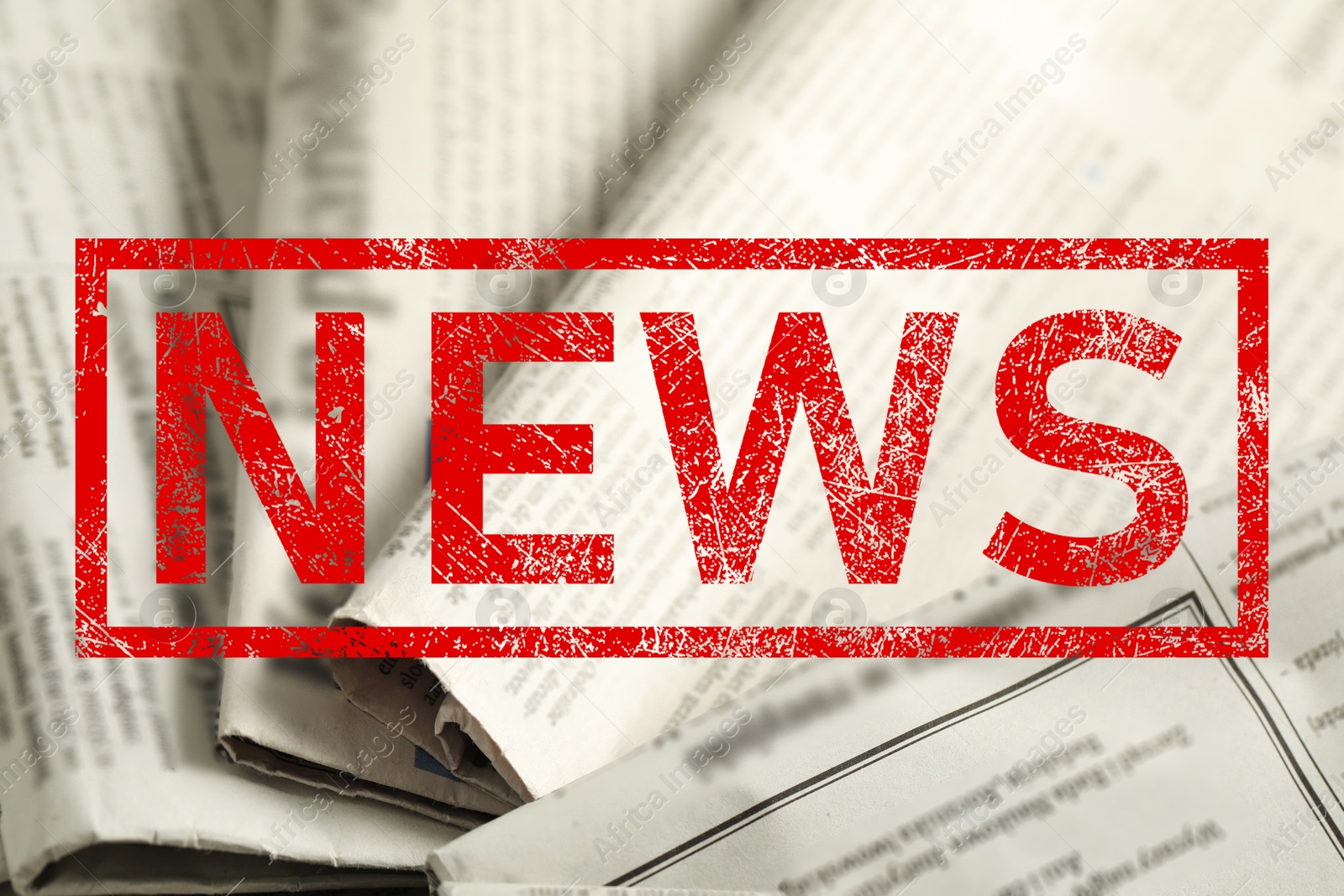Red News stamp and newspapers as background, closeup Image of Red News stamp and newspapers as background, closeup