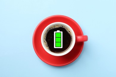 Image of Cup of coffee with fully charged battery indicator on light blue background, top view. Restoring energy with caffeine