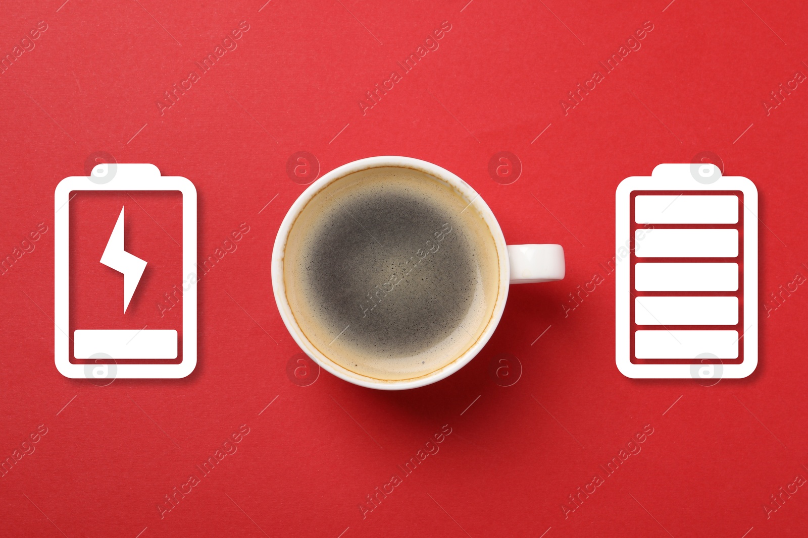 Cup of coffee and battery indicators on red background, top view. Restoring energy with caffeine Image of Cup of coffee and battery indicators on red background, top view. Restoring energy with caffeine