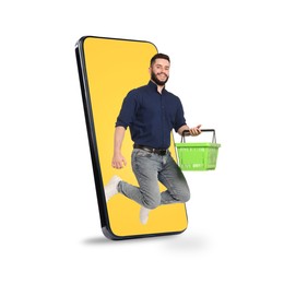 Image of Man with shopping basket jumping out of mobile phone against white background. Online ordering