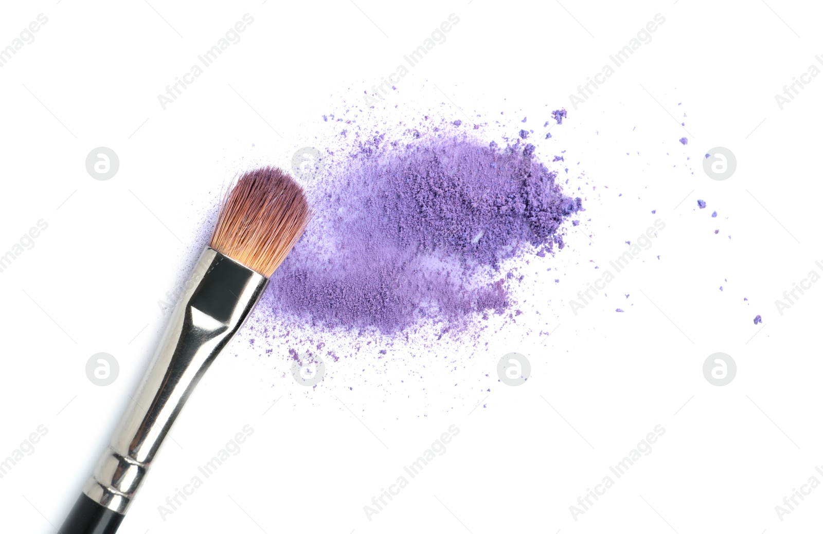 Makeup brush with purple eye shadow isolated on white, top view Photo of Makeup brush with purple eye shadow isolated on white, top view