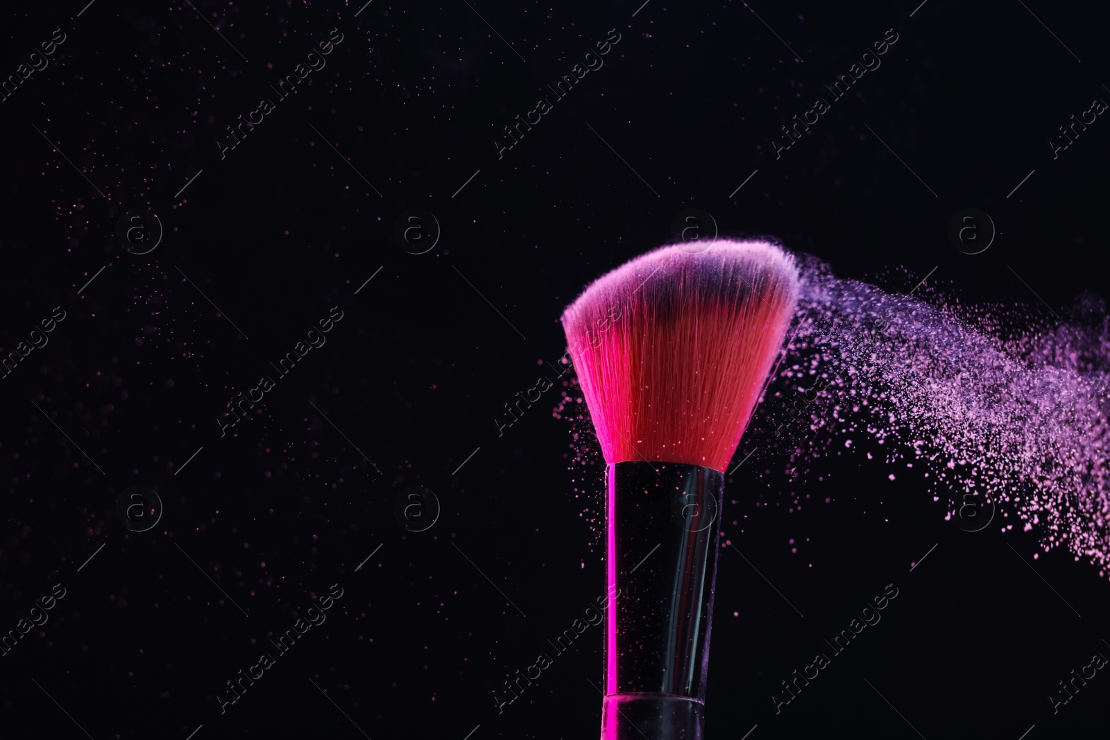 Makeup brush with color eye shadow on black background, closeup. Space for text Photo of Makeup brush with color eye shadow on black background, closeup. Space for text