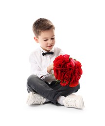 Photo of Cute little boy with bouquet of beautiful flowers on white background