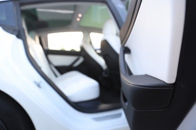Photo of Modern car interior with seats, view from outside
