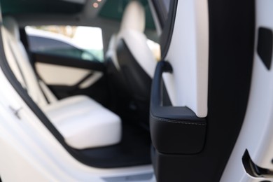 Photo of Modern car interior with seats, view from outside