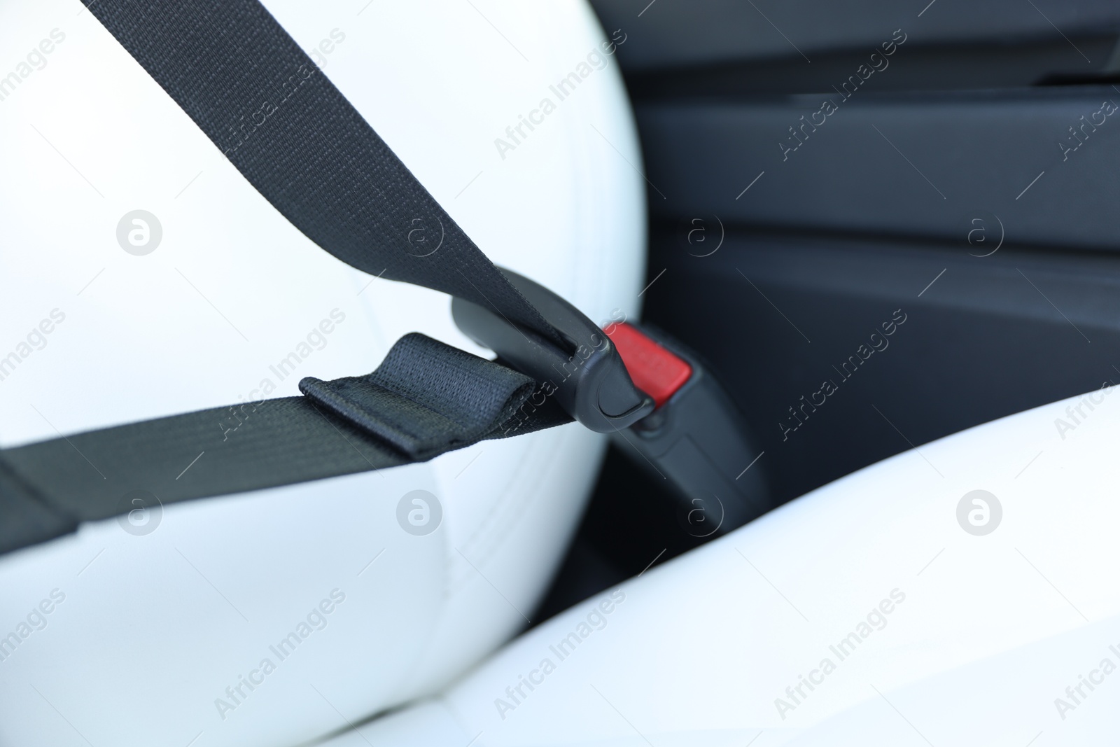 Safety belt and seat inside of modern car, closeup Photo of Safety belt and seat inside of modern car, closeup