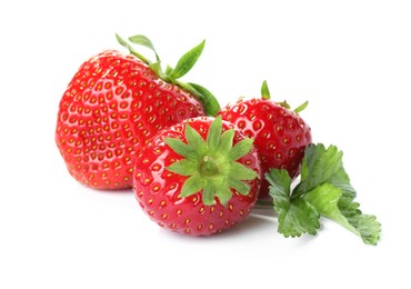 Photo of Fresh strawberries and green leaves isolated on white