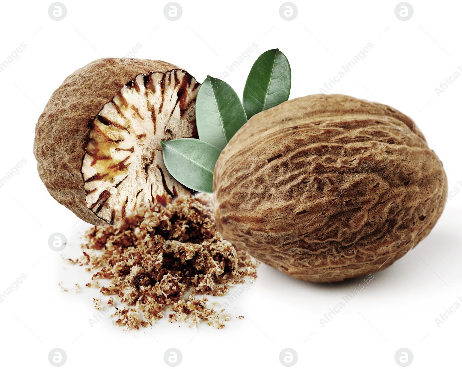 Nutmeg seeds with green leaves on white background. Aromatic spice Image of Nutmeg seeds with green leaves on white background. Aromatic spice