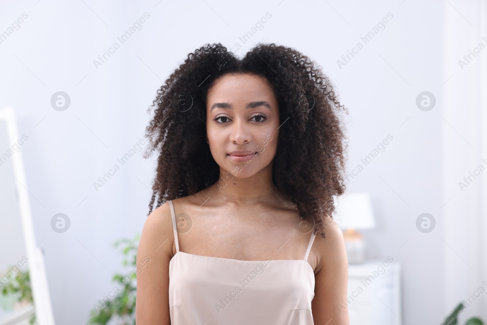 Beautiful Brazilian woman with healthy skin indoors Photo of Beautiful Brazilian woman with healthy skin indoors
