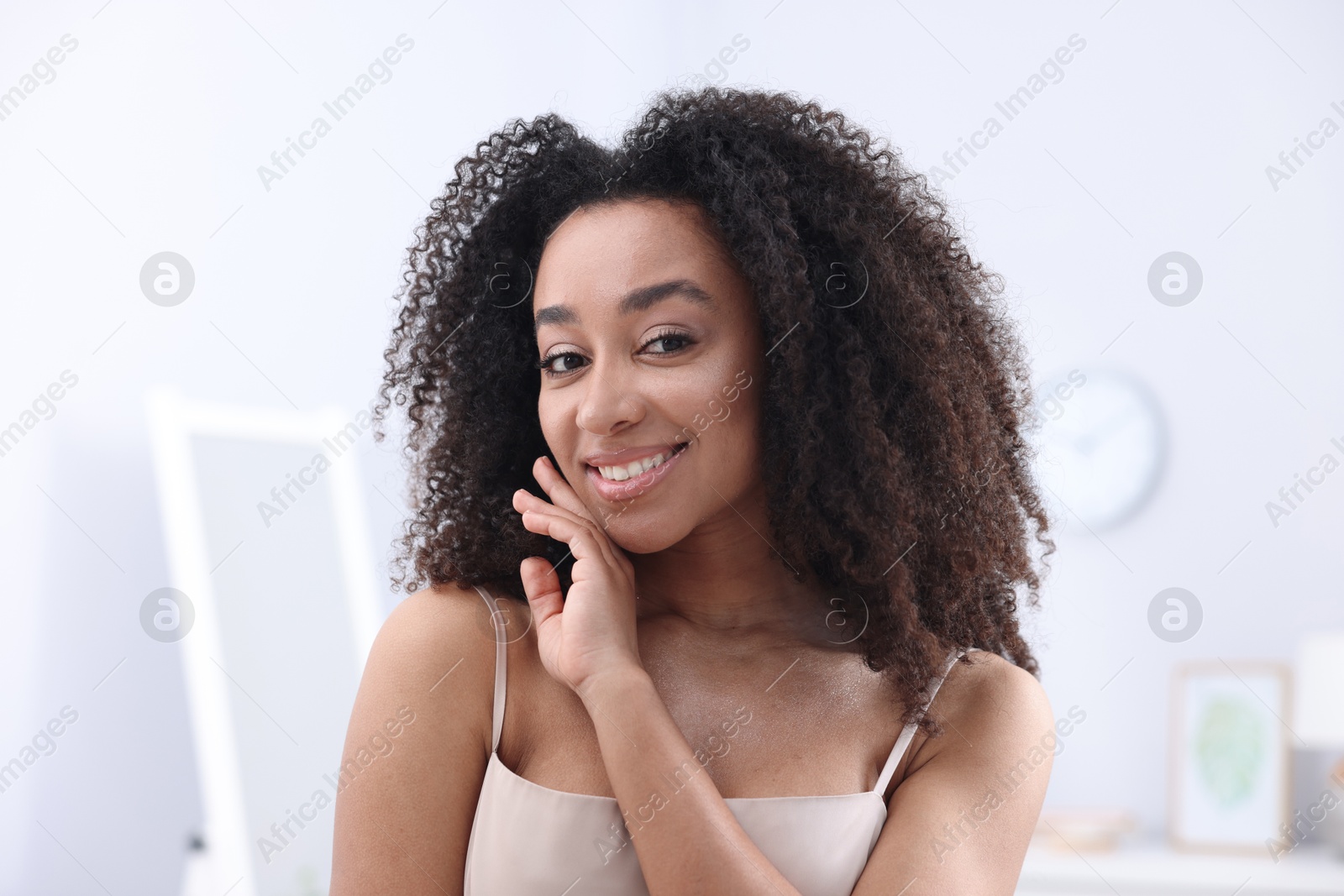 Beautiful Brazilian woman with healthy skin indoors Photo of Beautiful Brazilian woman with healthy skin indoors