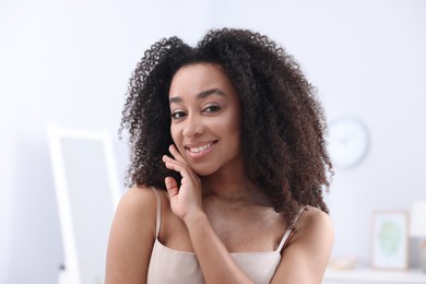 Photo of Beautiful Brazilian woman with healthy skin indoors