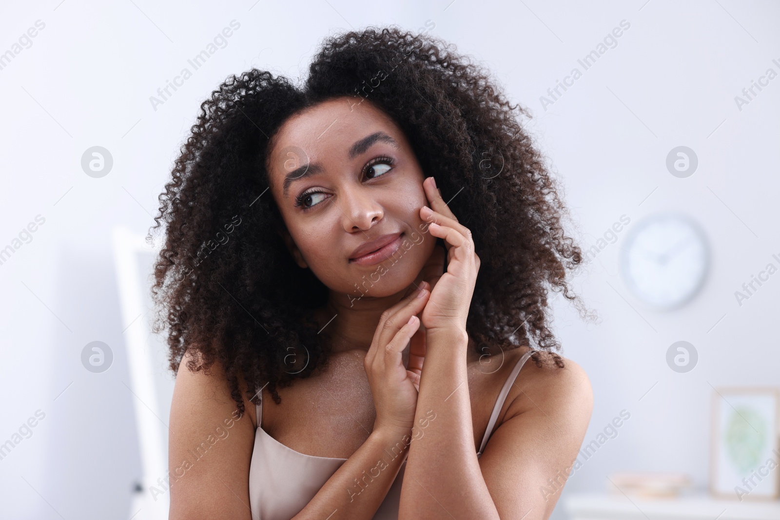 Beautiful Brazilian woman with healthy skin indoors Photo of Beautiful Brazilian woman with healthy skin indoors