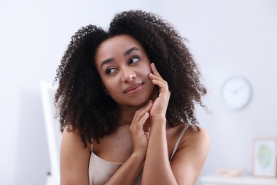 Photo of Beautiful Brazilian woman with healthy skin indoors