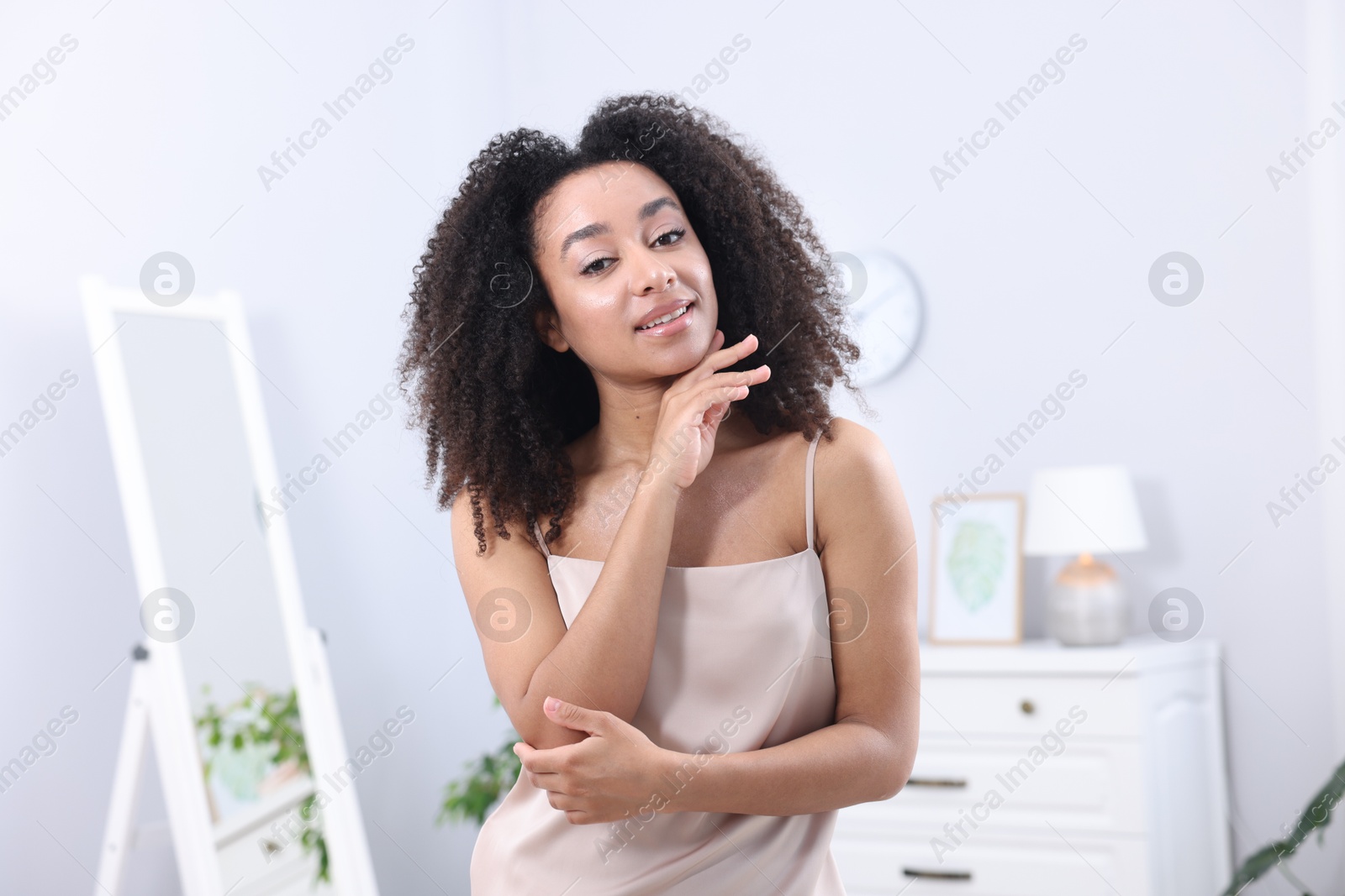 Beautiful Brazilian woman with healthy skin indoors Photo of Beautiful Brazilian woman with healthy skin indoors
