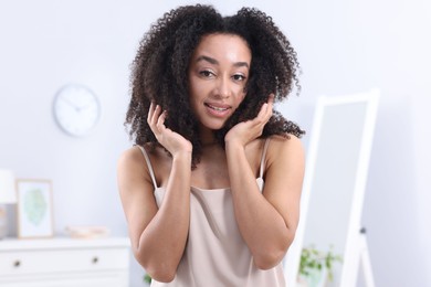 Photo of Beautiful Brazilian woman with healthy skin indoors