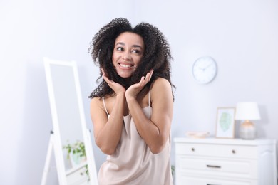 Photo of Beautiful Brazilian woman with healthy skin indoors