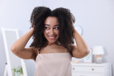 Photo of Beautiful Brazilian woman with healthy skin indoors