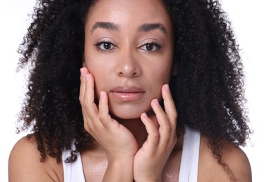 Photo of Beautiful Brazilian woman with healthy skin on white background