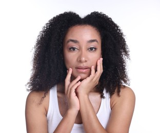 Photo of Beautiful Brazilian woman with healthy skin on white background