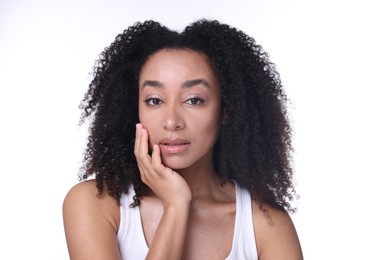 Photo of Beautiful Brazilian woman with healthy skin on white background