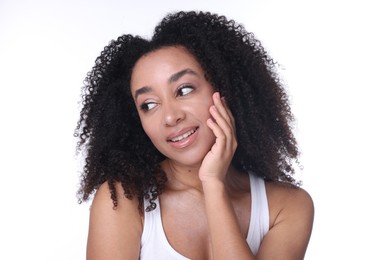 Photo of Beautiful Brazilian woman with healthy skin on white background