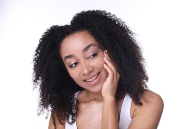 Photo of Beautiful Brazilian woman with healthy skin on white background