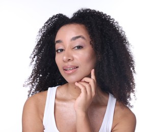 Photo of Beautiful Brazilian woman with healthy skin on white background