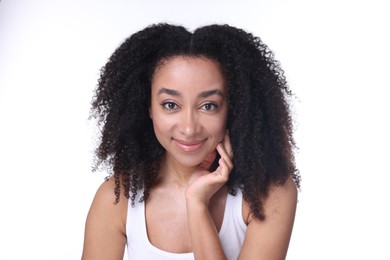 Photo of Beautiful Brazilian woman with healthy skin on white background