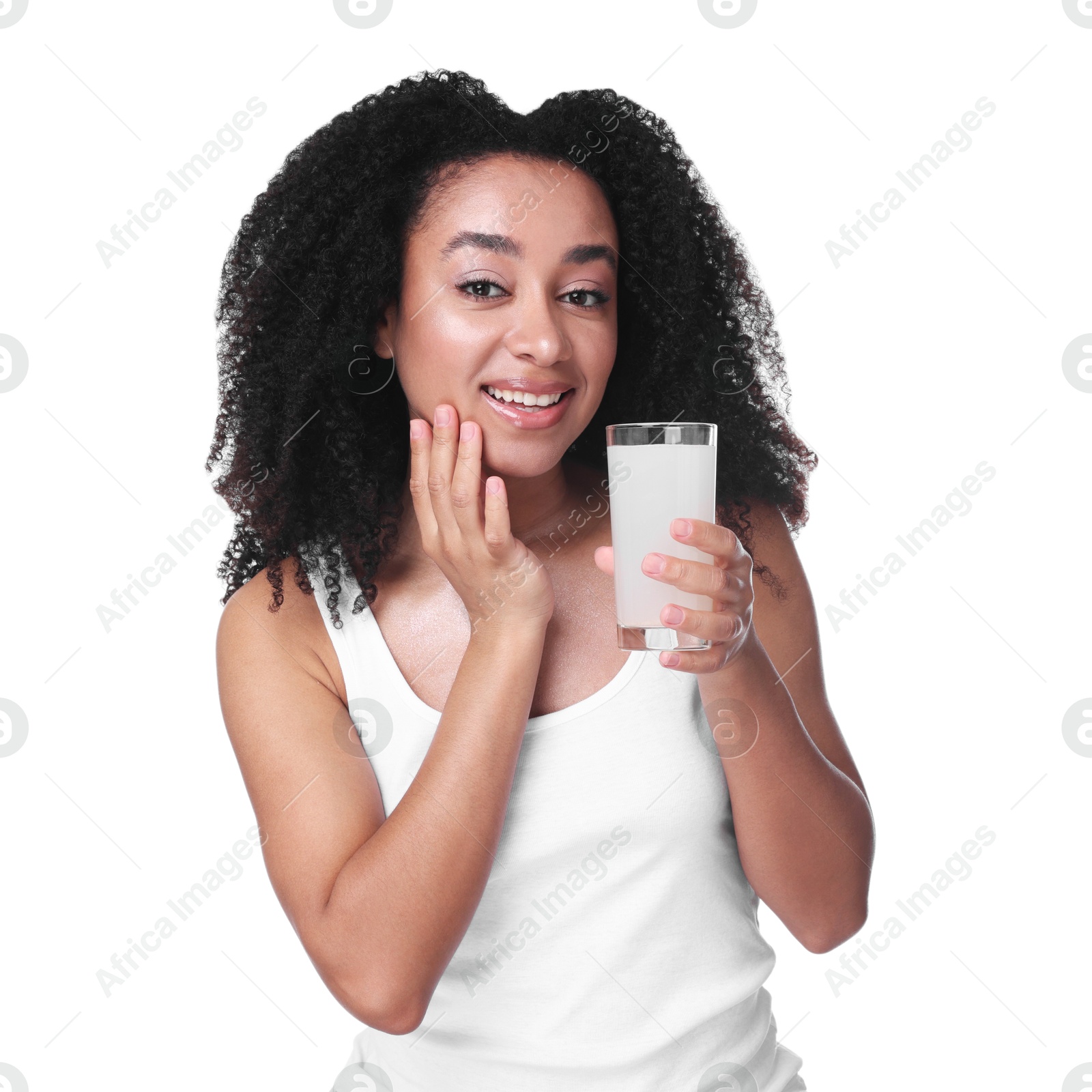 Beautiful Brazilian woman with glass of collagen water on white background Photo of Beautiful Brazilian woman with glass of collagen water on white background
