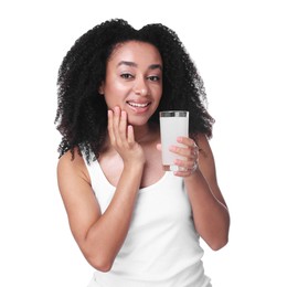 Photo of Beautiful Brazilian woman with glass of collagen water on white background