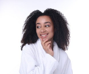 Photo of Beautiful Brazilian woman with healthy skin on white background