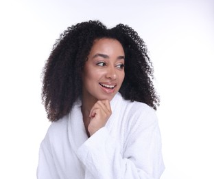 Photo of Beautiful Brazilian woman with healthy skin on white background