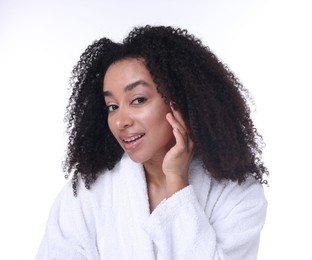 Photo of Beautiful Brazilian woman with healthy skin on white background