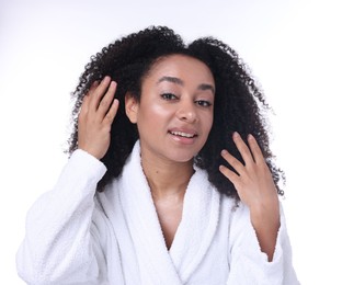 Photo of Beautiful Brazilian woman with healthy skin on white background