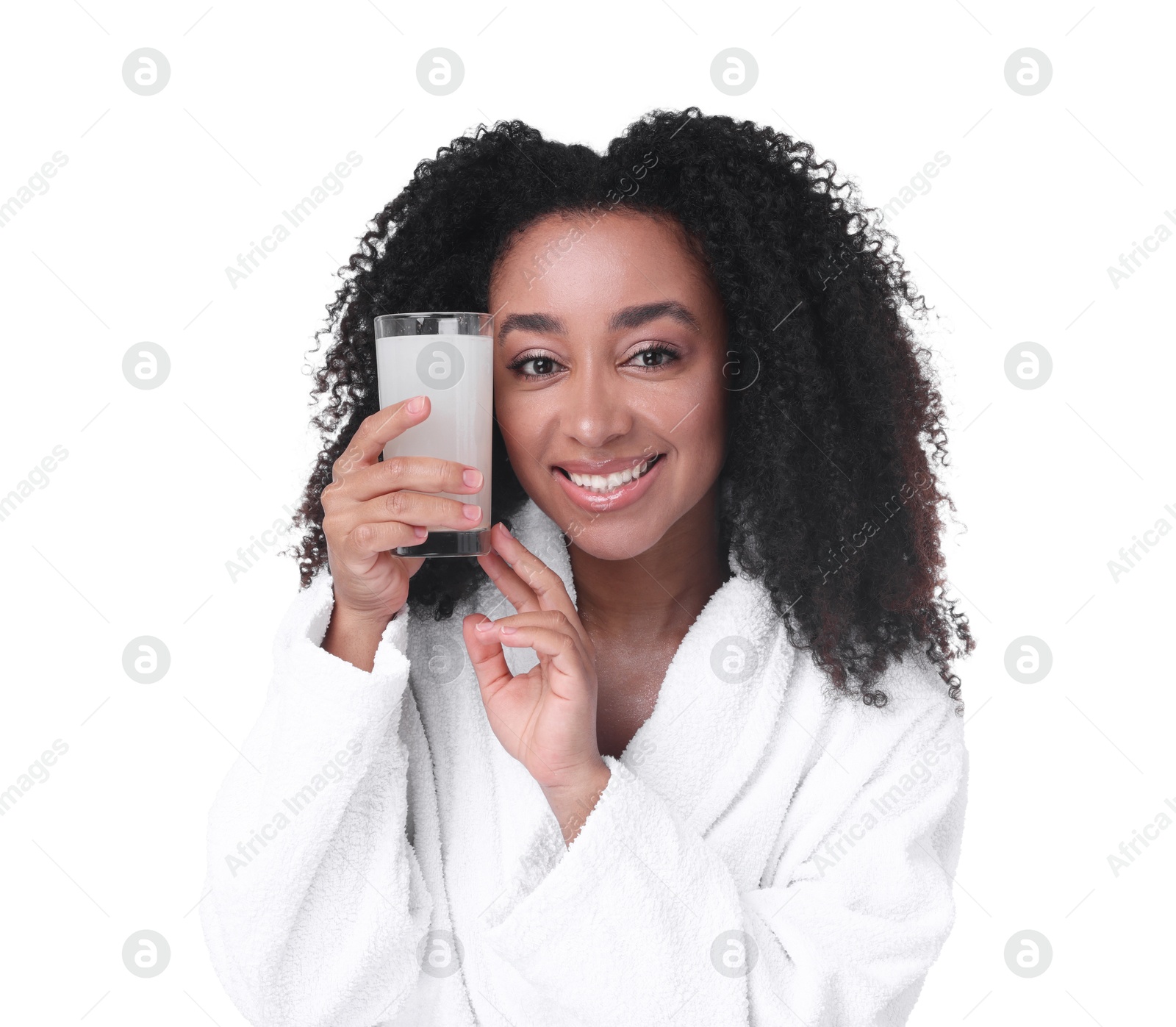 Beautiful Brazilian woman with glass of collagen water on white background Photo of Beautiful Brazilian woman with glass of collagen water on white background