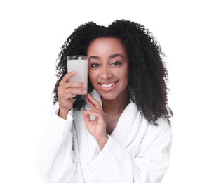 Photo of Beautiful Brazilian woman with glass of collagen water on white background
