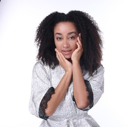 Photo of Beautiful Brazilian woman with healthy skin on white background
