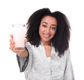 Photo of Beautiful Brazilian woman with glass of collagen water on white background