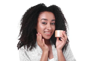 Photo of Beautiful Brazilian woman with jar of collagen cream on white background