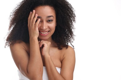 Photo of Portrait of beautiful Brazilian woman after spa treatment on white background