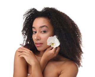 Photo of Portrait of beautiful Brazilian woman with orchid flower after spa treatment on white background